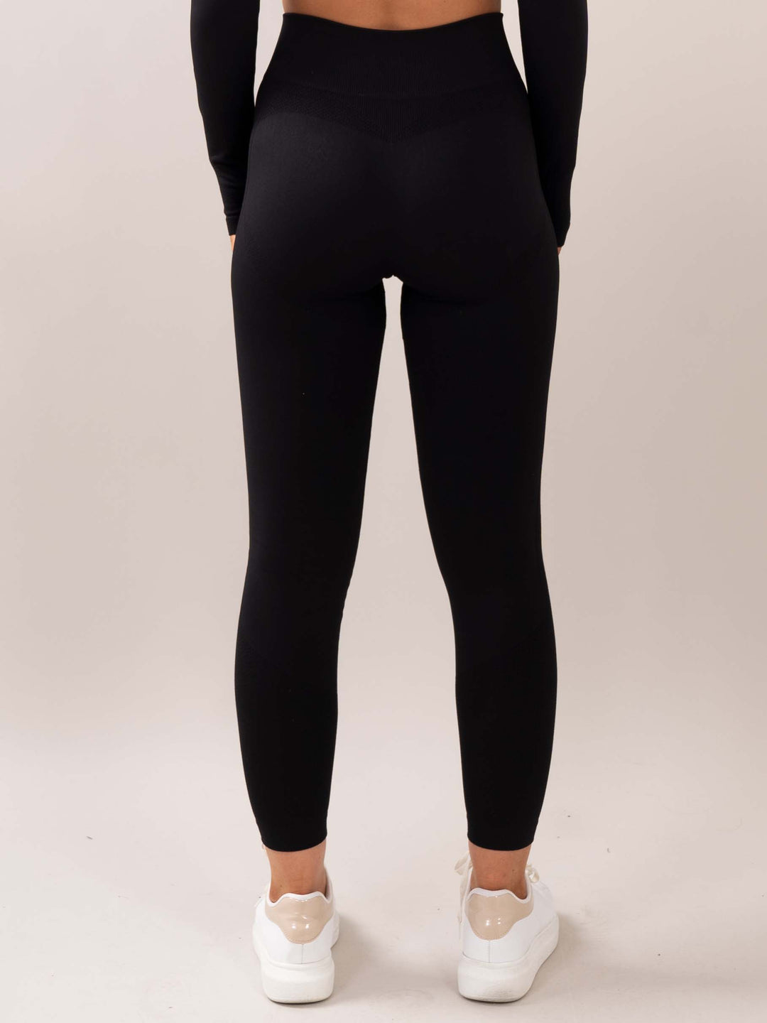 Four Black seamless tights back