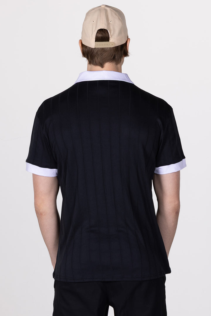Male in Black Golf Polo Ace from Divina back