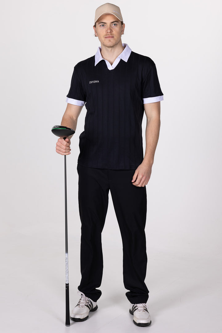Male in Black Golf Polo Ace from Divina Whole body with driver in hand