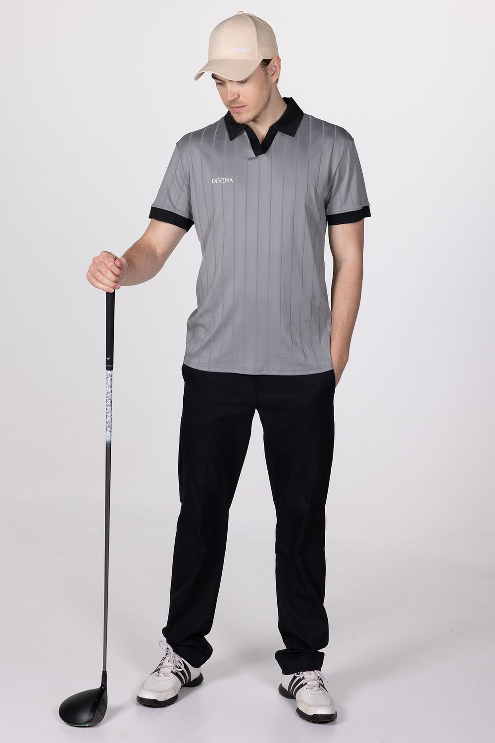 Male in Grey Golf Polo Ace from Divina Whole body with driver in hand