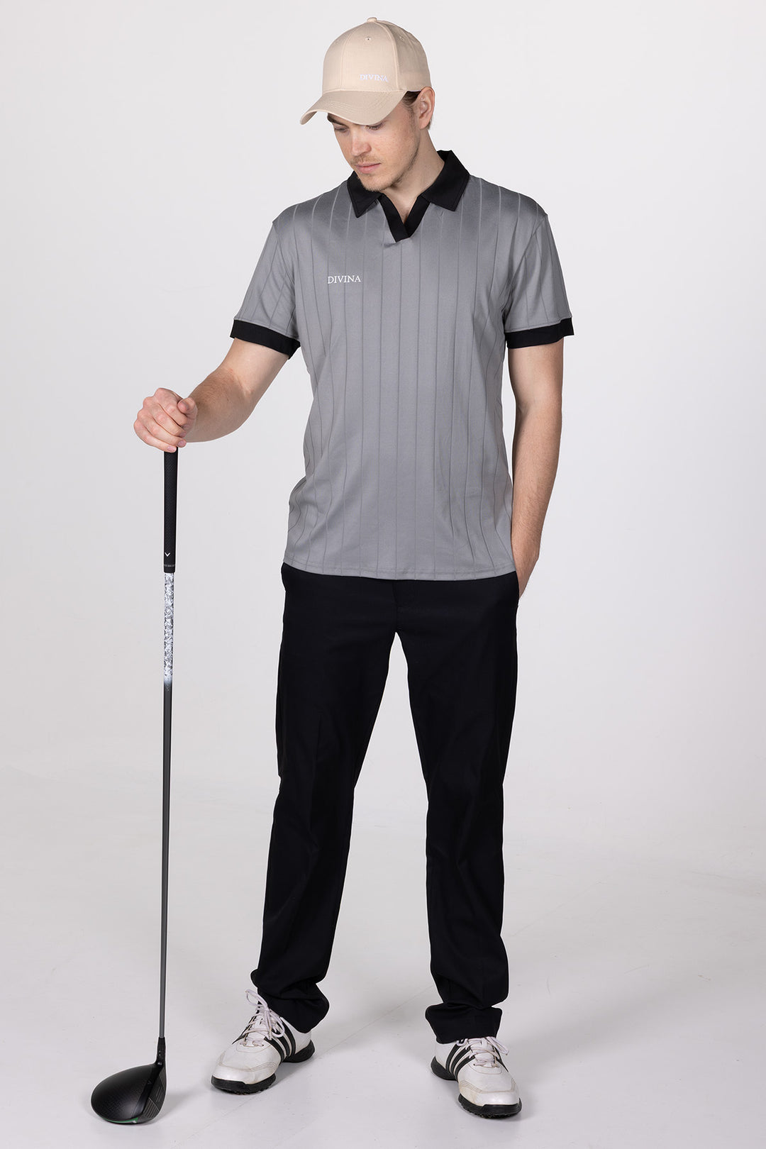 Male in Grey Golf Polo Ace from Divina Whole body with driver in hand