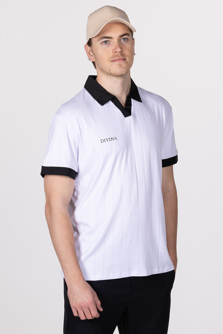 Male in White Golf Polo Ace from Divina side