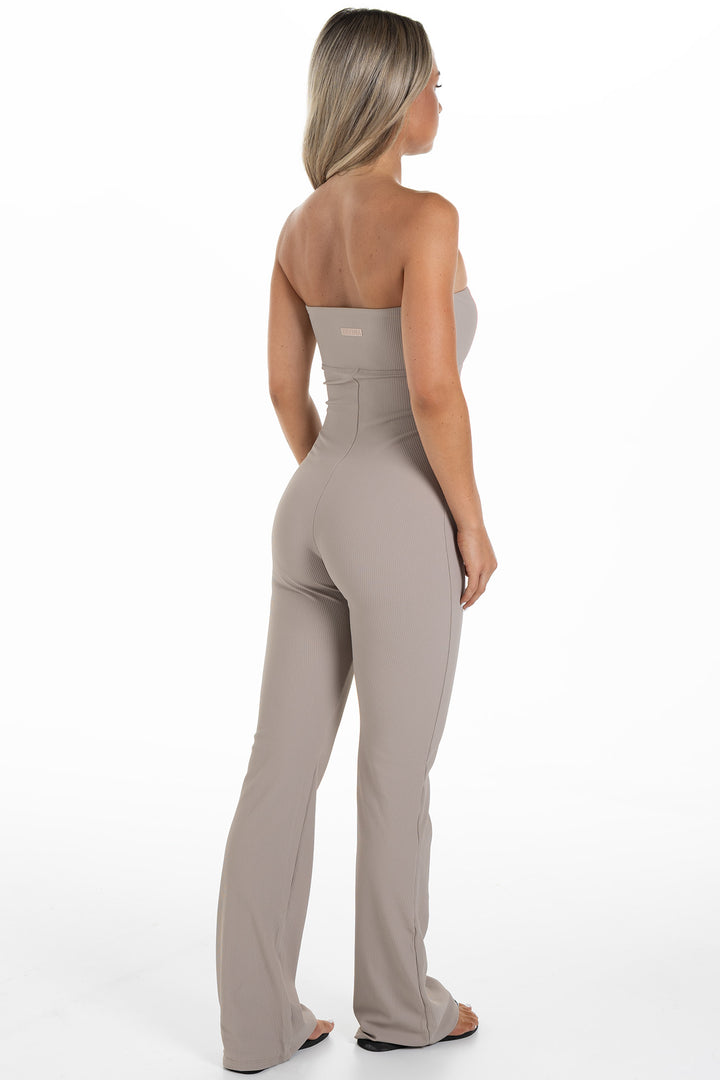 Woman in Beige Ribbed Jumpsuit Palma Side